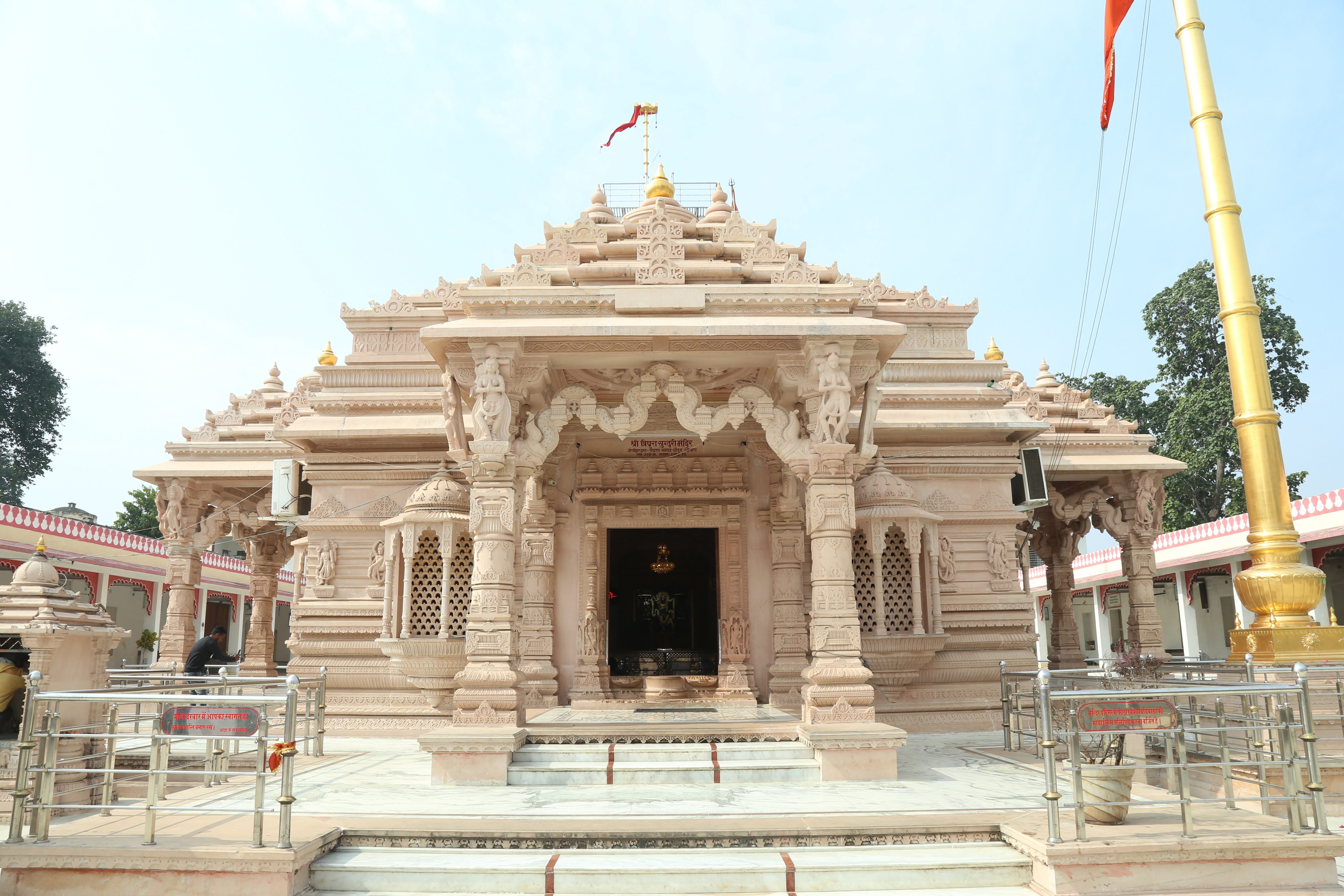 Temple Front View - Close-up of main temple with intricate stone carvings
